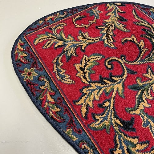 Vintage tapijt warme rood/roze, donkerblauw, oker van kleur